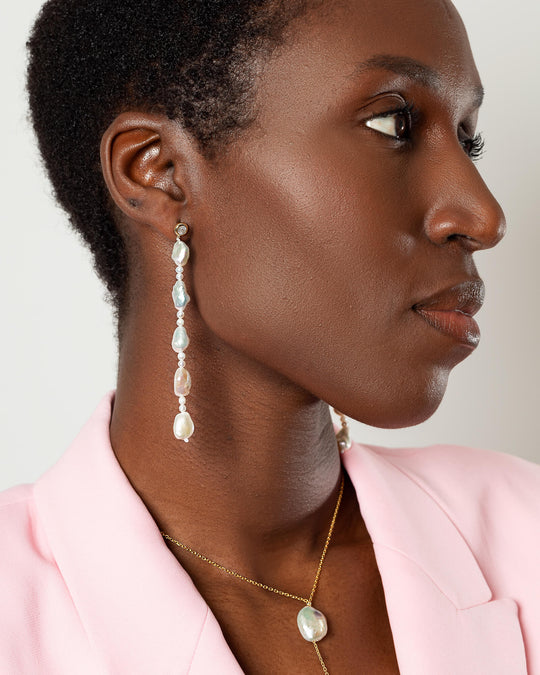 Keshi Earrings with delicate keshi pearls and smaller pearls interspersed, crafted from high-quality sterling silver.