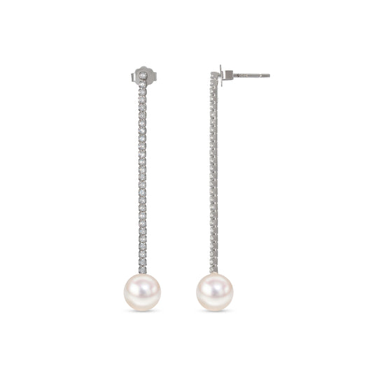 handcrafted pearl and CZ tennis earrings, featuring delicate rows of sparkling CZ stones and a lustrous freshwater pearl at the end
